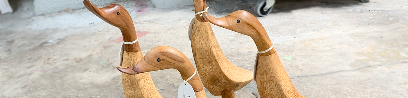 Discover enchanting wildlife wood carvings at Barouke. Bring home the beauty of nature with handcrafted wooden ducks and penguins.