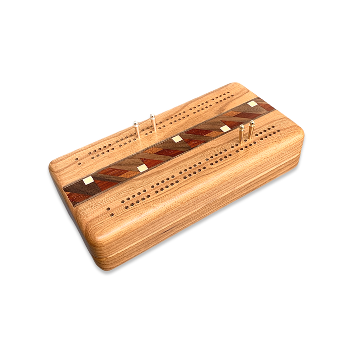 Two-player travel cribbage with wood inlay and peg storage.