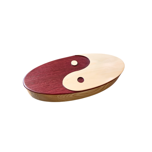 Oval Yin Yang wooden box with a polished finish. Artisan-crafted from Purpleheart & Maple woods.