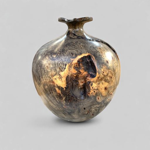 One-of-a-kind vase crafted from rare buckeye burl wood with intricate grain patterns