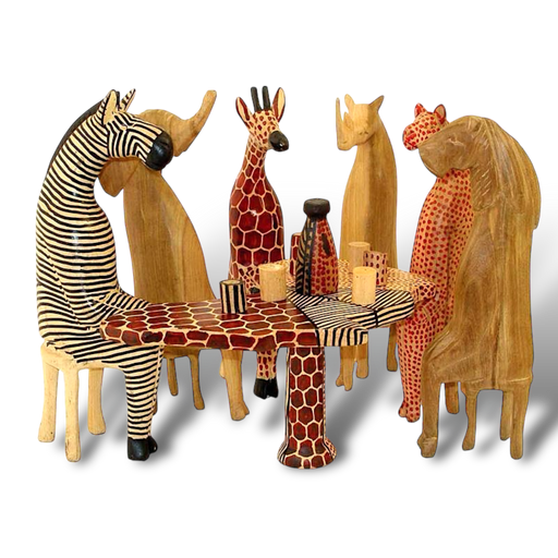 Hand-carved mahogany African animals sculpture set around Africa-shaped table with drinks cups and flask, crafted by Kenyan artisans.