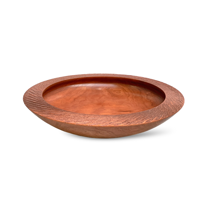 Locally made cherry wood bowl with textured rime crafted by Dennis Belcher.