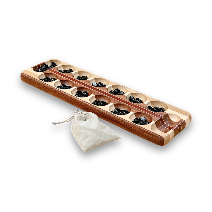 handmade wooden mancala set handcrafted from solid hardwoods. Comes with suede drawstring suede pouch.